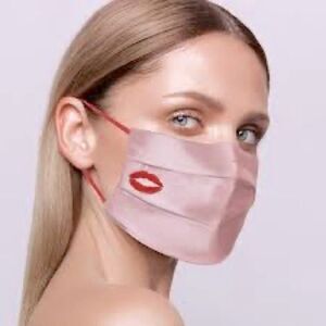 Silk reusable pink facemask with dark pink stitched lips.  Limited release. NWT